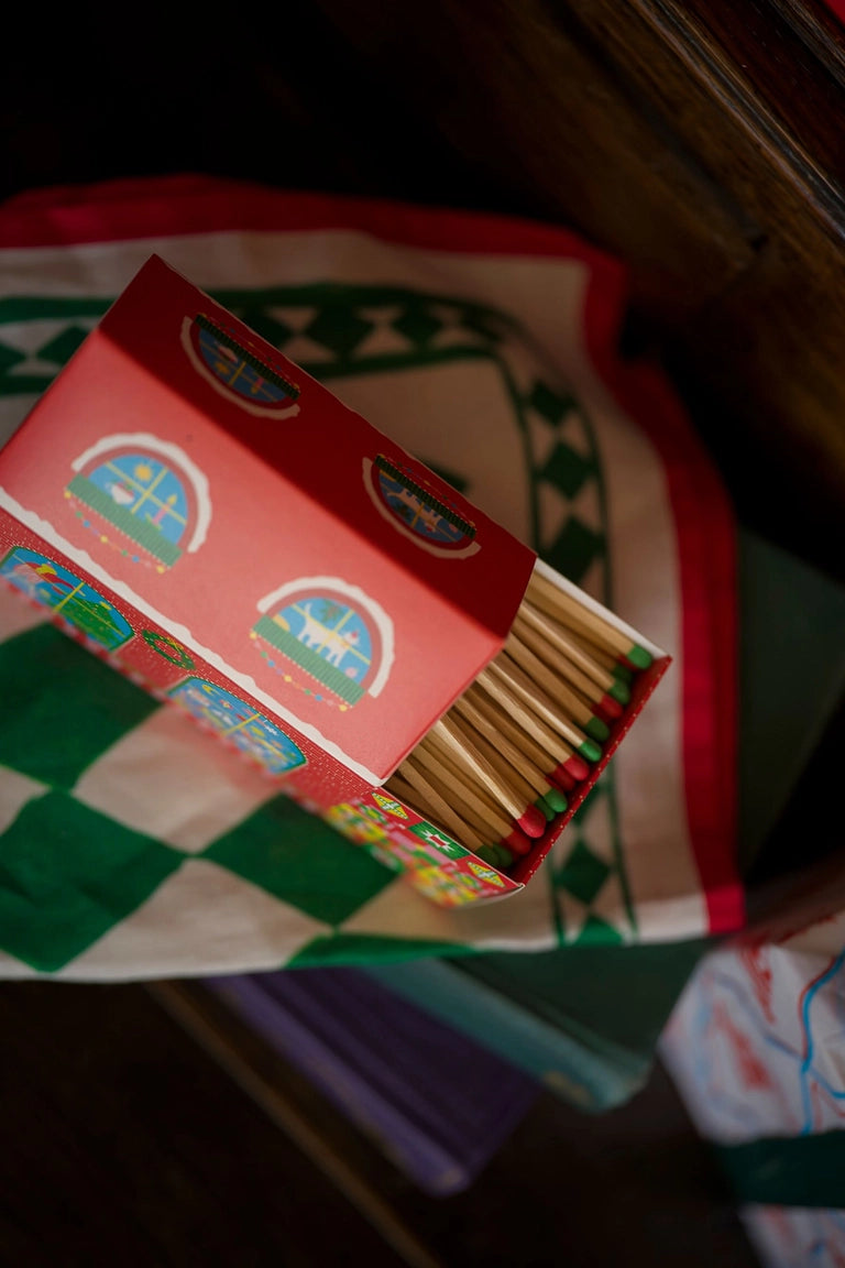 Box of matches on a checkered tablecloth