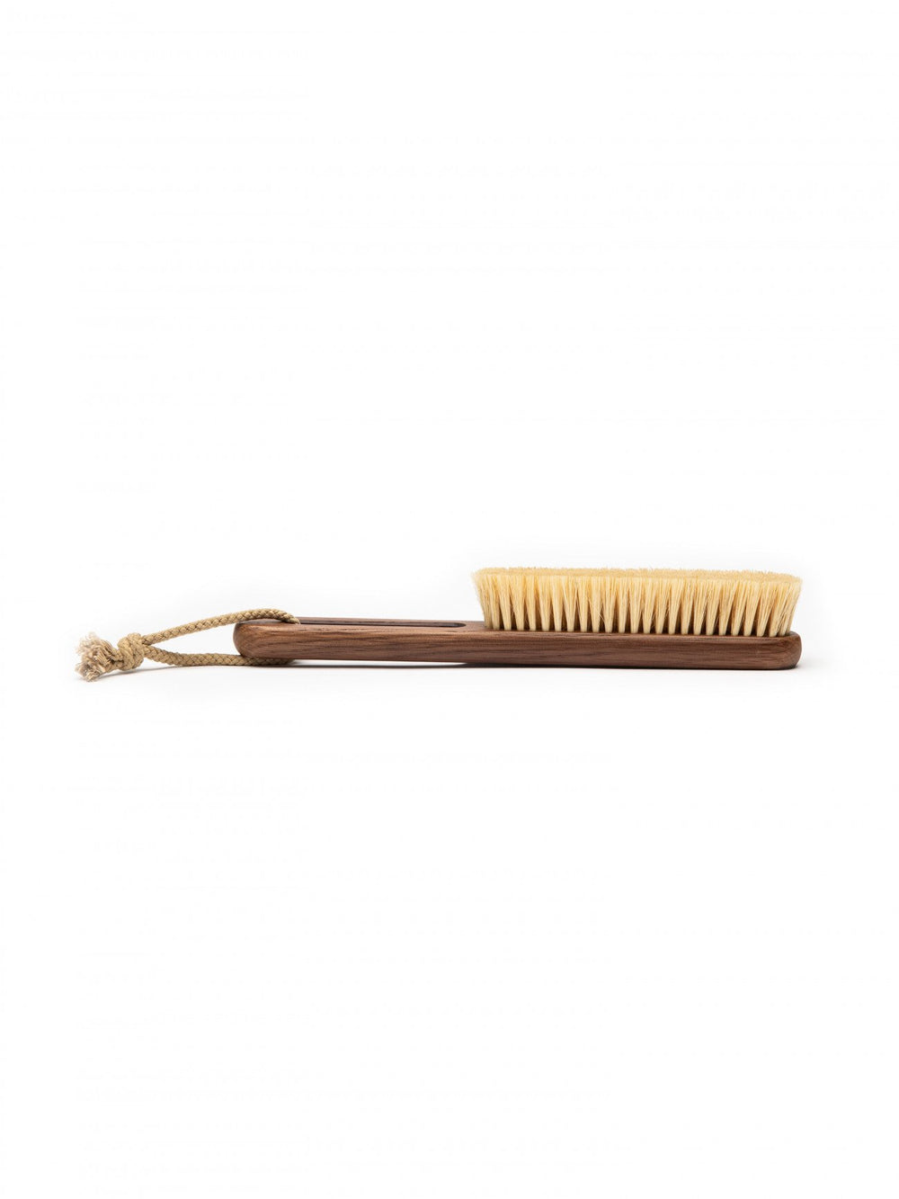 Long-handled brush with bristle head on a white background