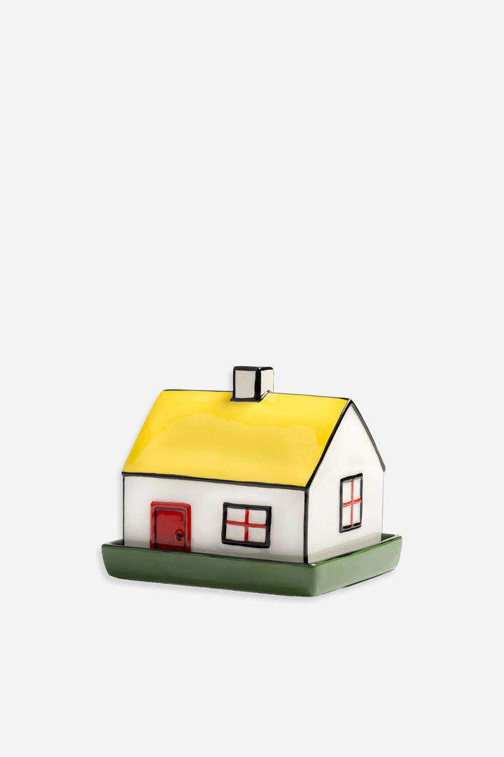 Small cottage butter dish with a yellow roof 