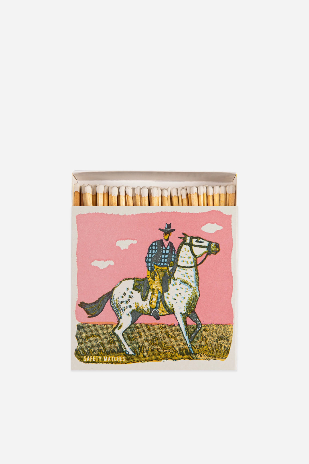 luxury matches with vintage cowboy print on pink background