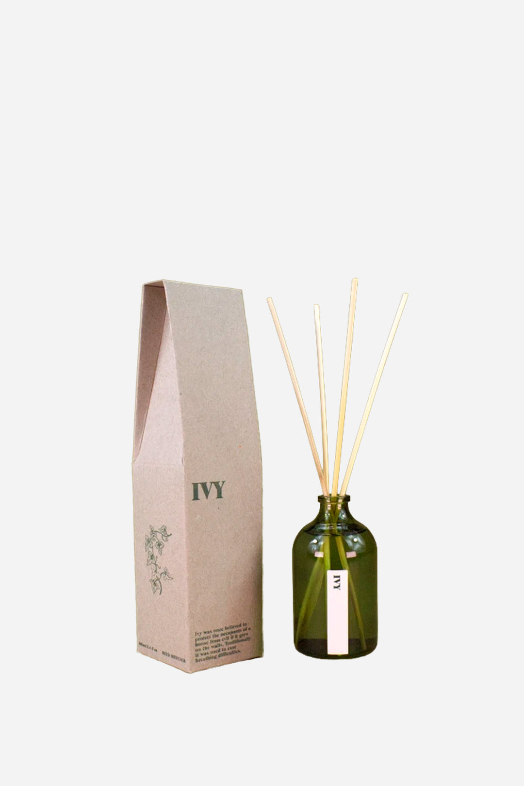 An IVY reed diffuser set featuring an olive green glass bottle with natural reed sticks, next to its light brown kraft paper packaging box on a clean white background.