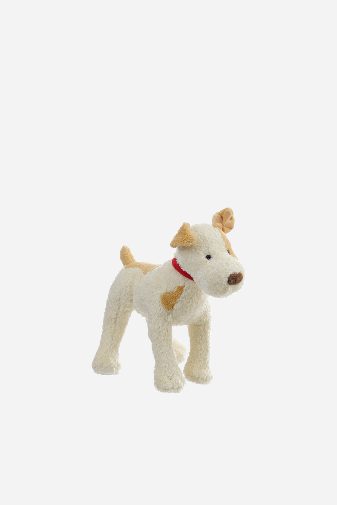 medium eliot dog soft toy on grey background