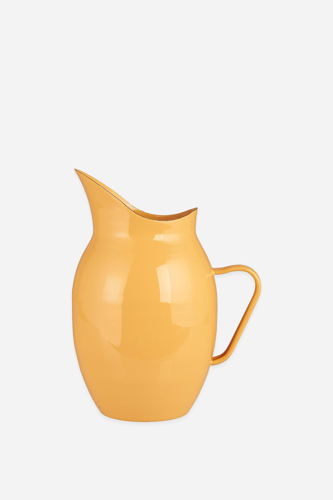 Yellow pitcher on a light gray background