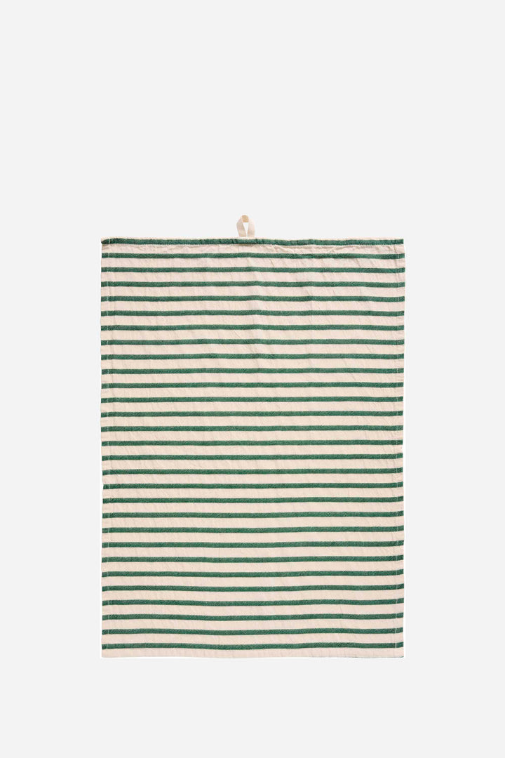 Striped green and white towel hanging on a white background