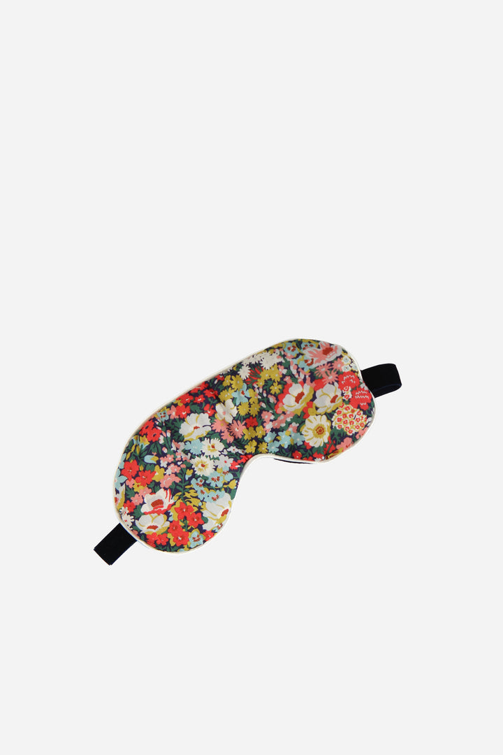 Floral patterned sleep mask on a white background