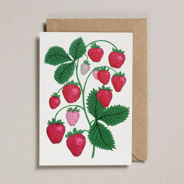 Greeting card with strawberry design on a beige background