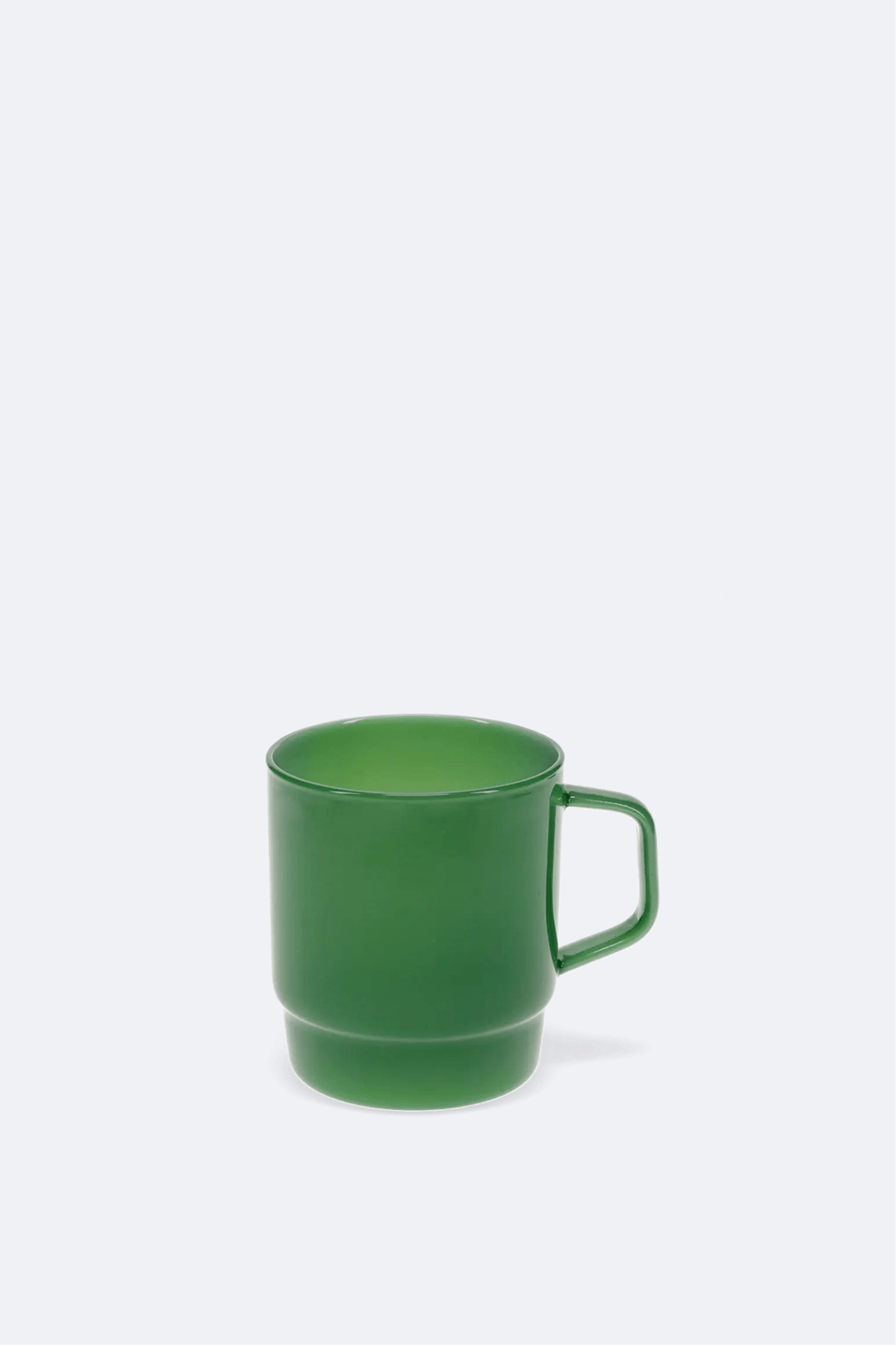 Green mug on a white background