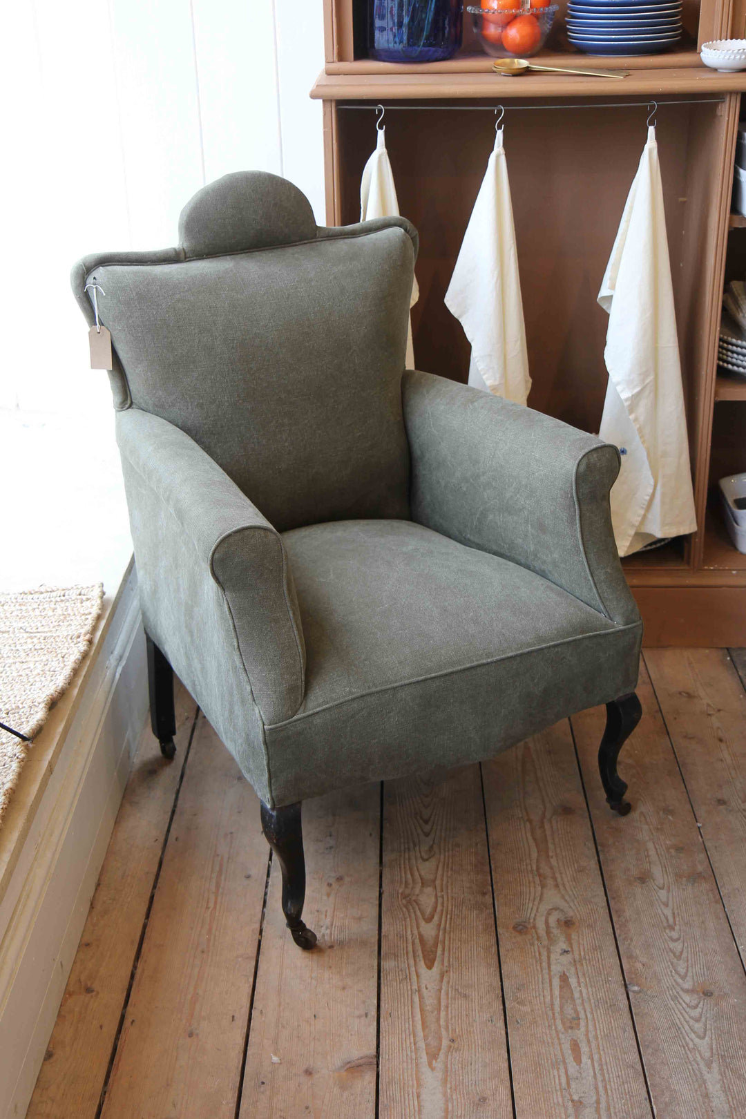 green khaki linen armchair