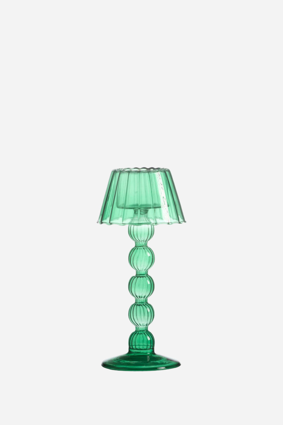 Green table lamp with a ribbed design on a white background