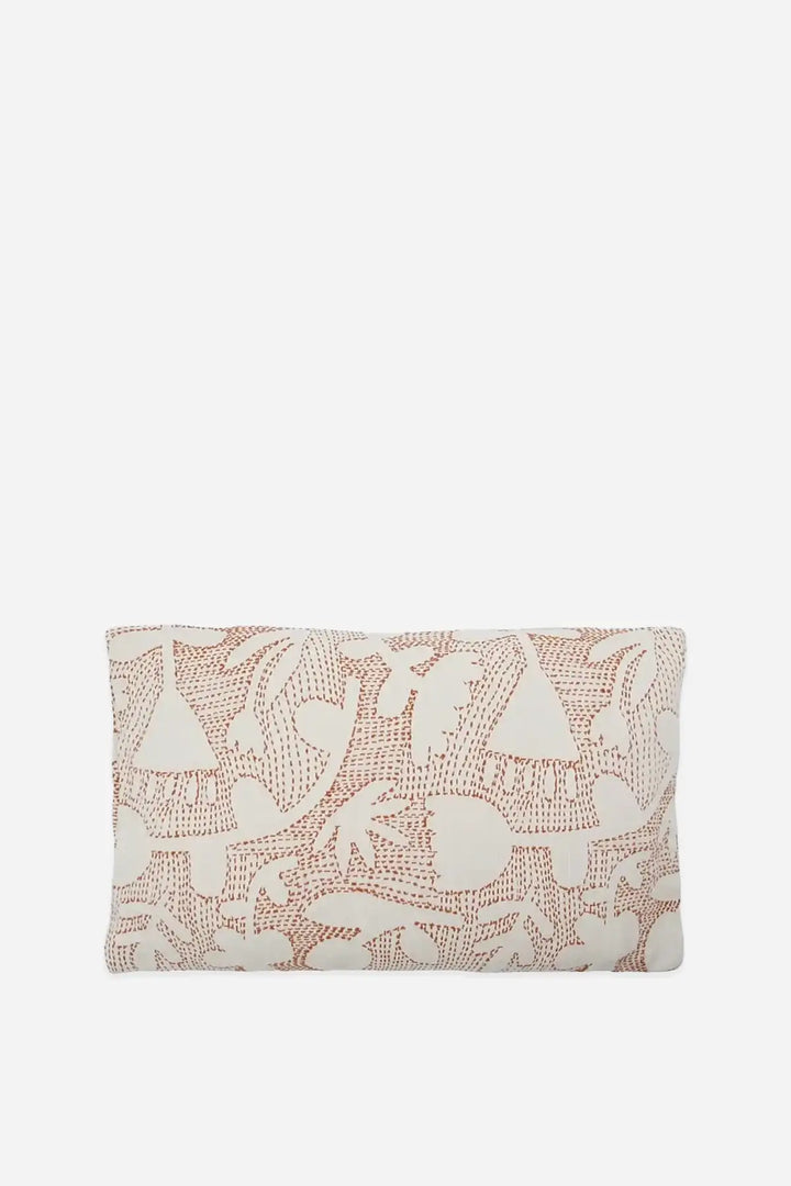 A rectangular cushion with decorative kantha stitching