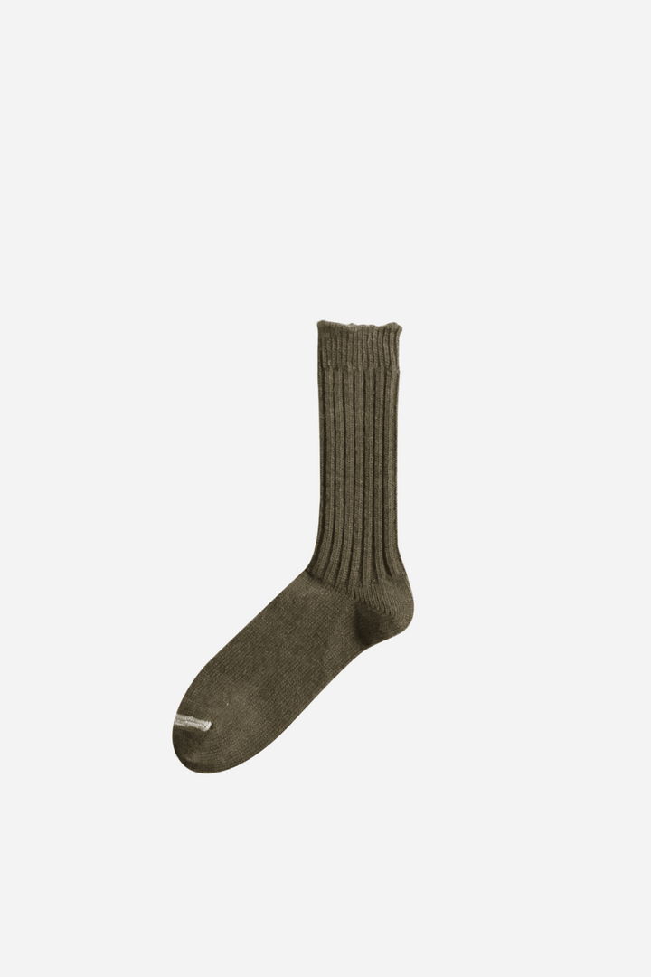 Green sock on a white background