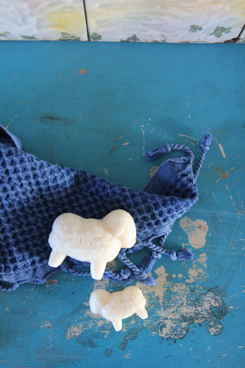 lamb and sheep shaped soaps with blue waffle towel