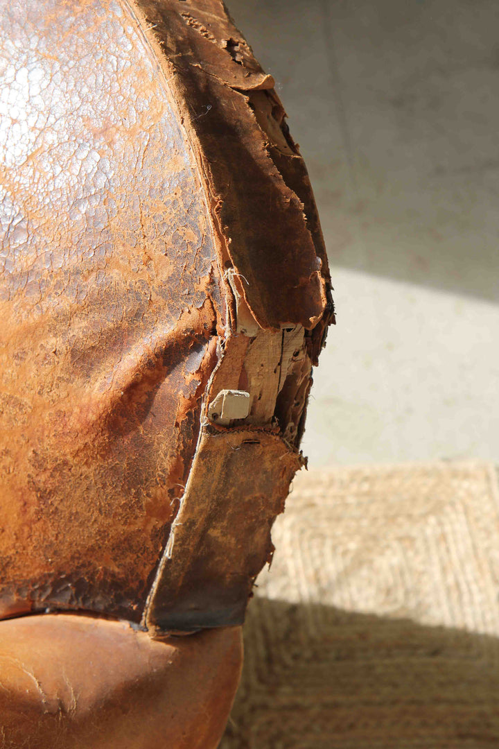 Close-up of a rusty metal object with a textured surface