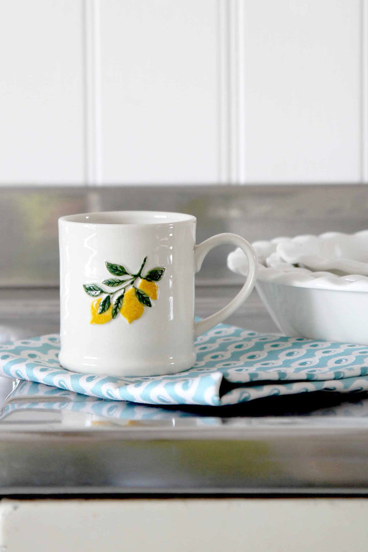 lemon branch mug on stainless steel worktop
