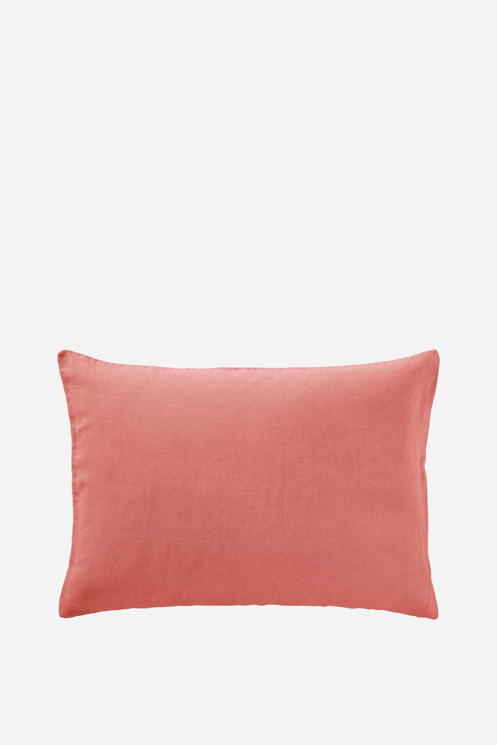 Pink pillow on a white background
