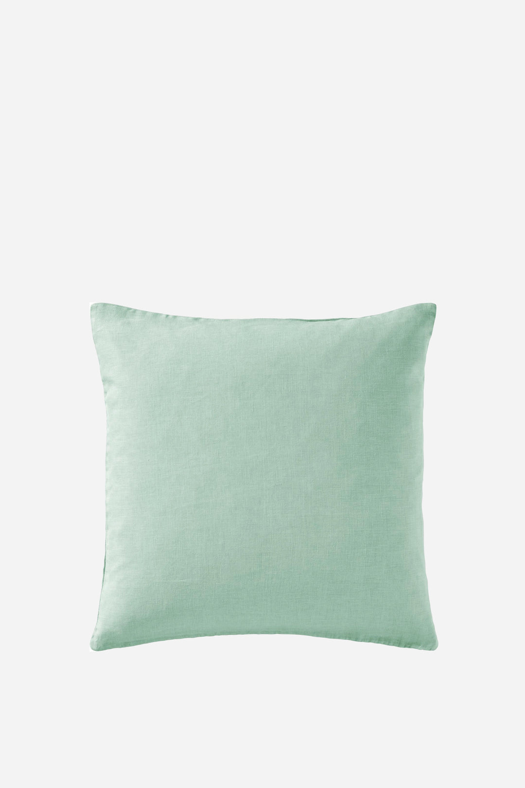 Pistachio Green linen cushion on a white background