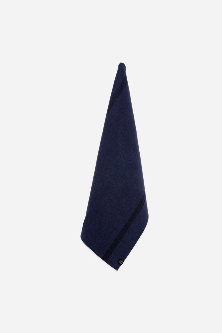 Navy blue t-towel on a white background