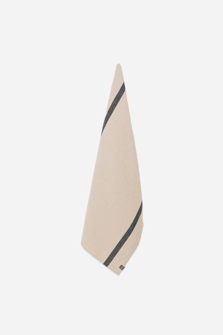 Beige t-towel with black stripe on a white background