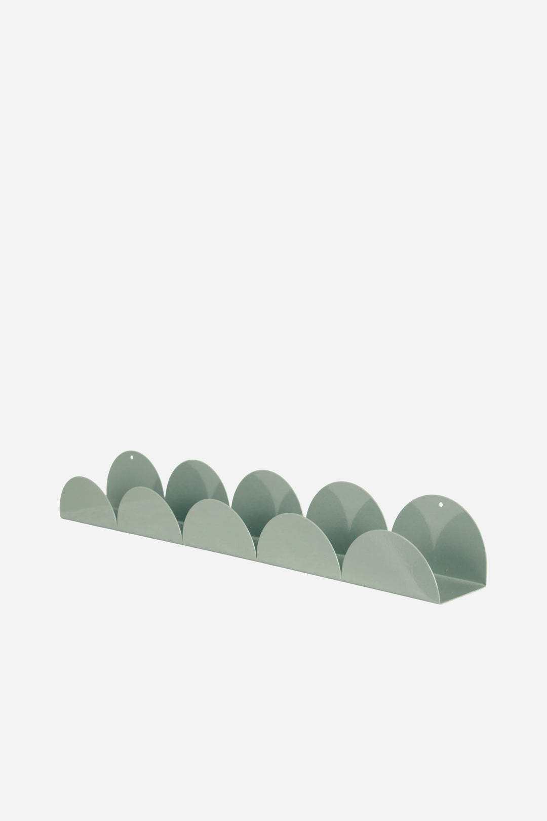 Green egg-shaped holder on a white background
