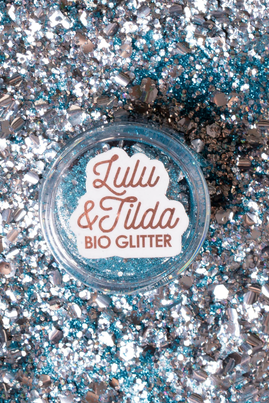 Lulu &amp; Tilda BIO GLITTER container on a glittery background