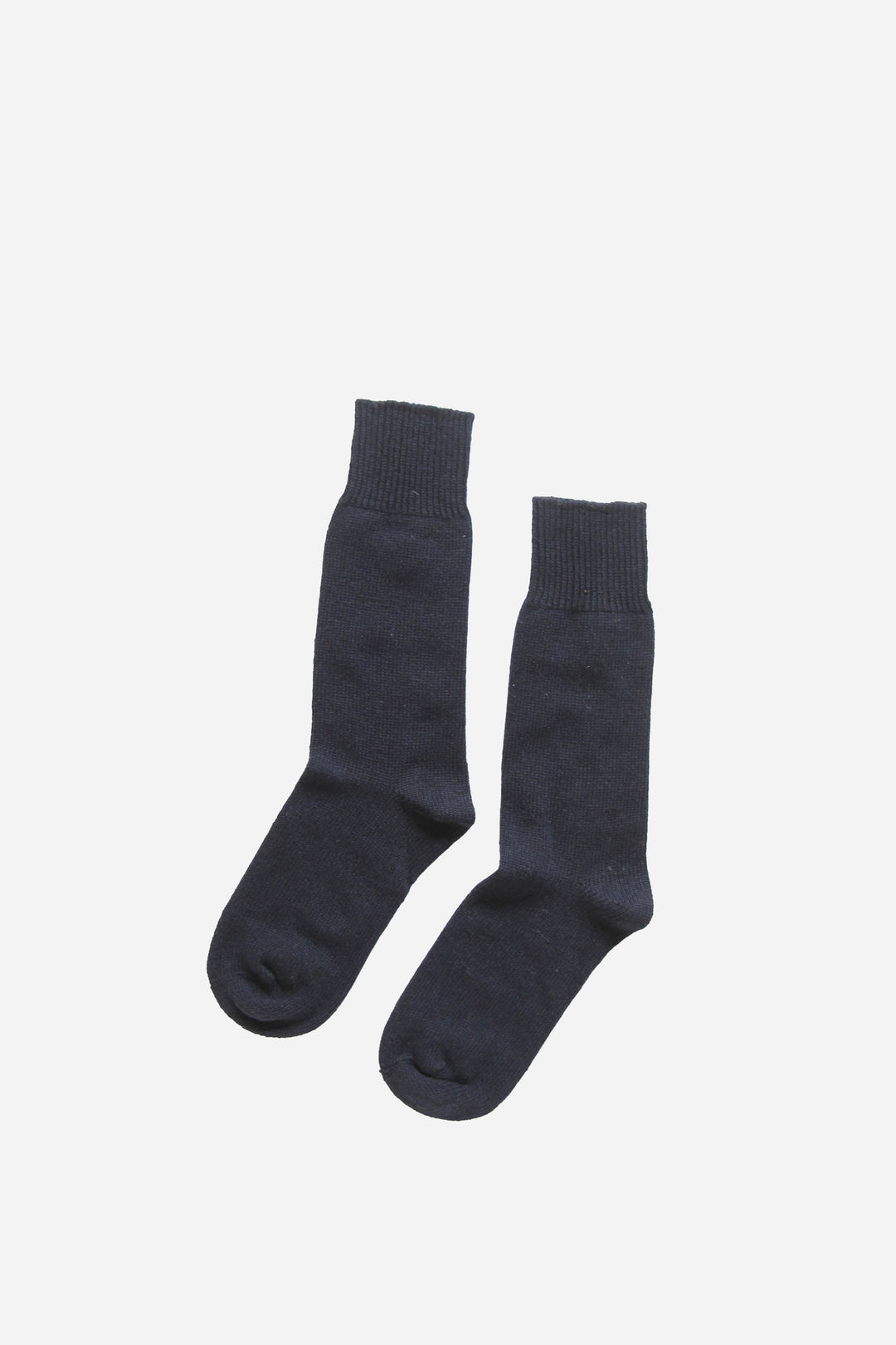 plain navy mens socks on white background