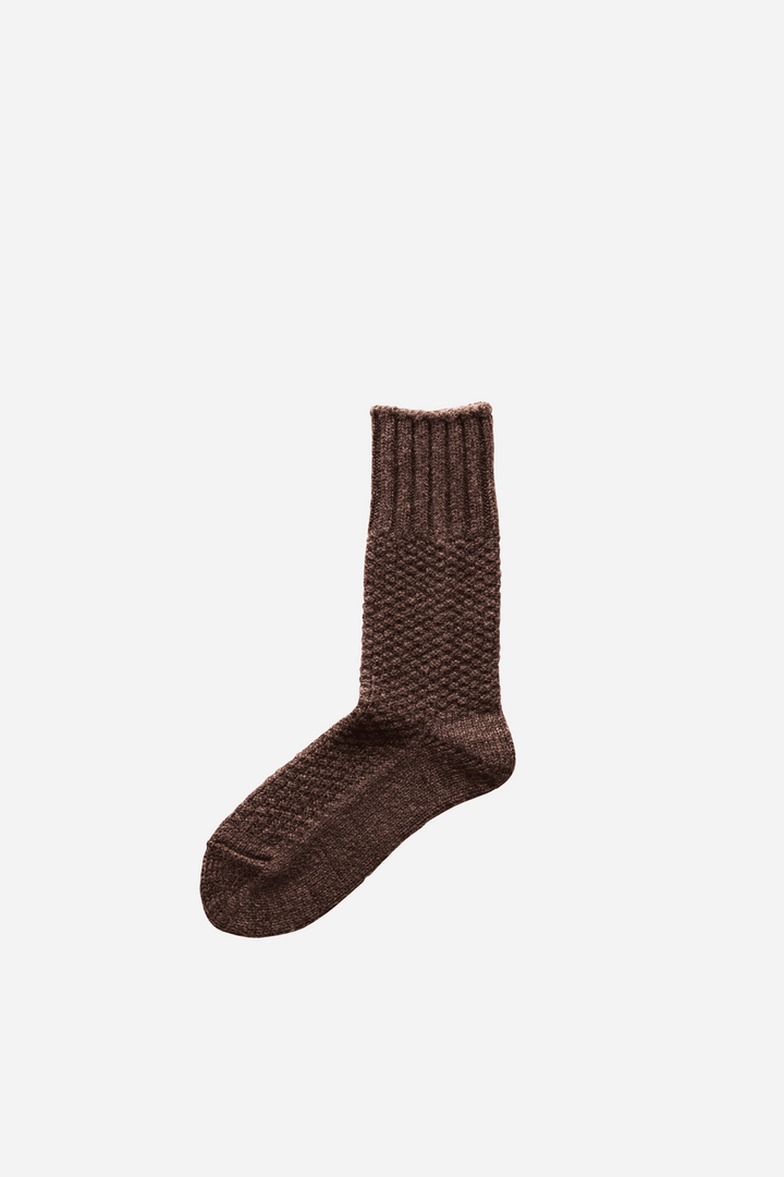 Brown sock on a white background