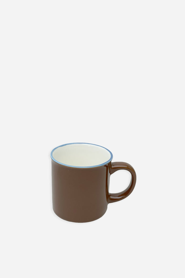 brown mug with blue rim