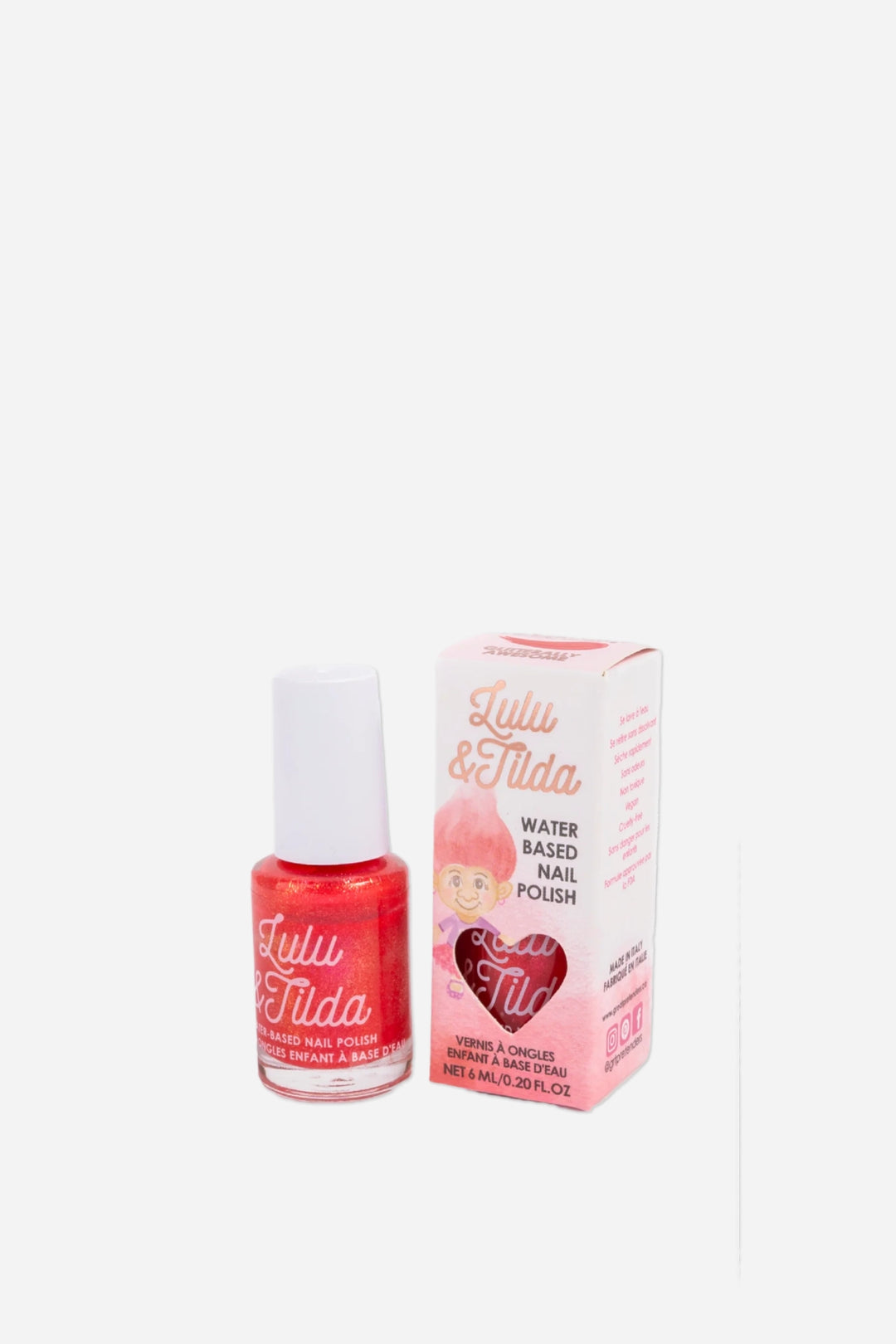 A bottle of Lula & Tilda water-based nail polish in a bright coral-red shade, shown next to its pink and white retail box on a plain white background.