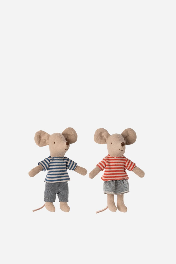 Two toy mice dressed in striped shirts on a white background