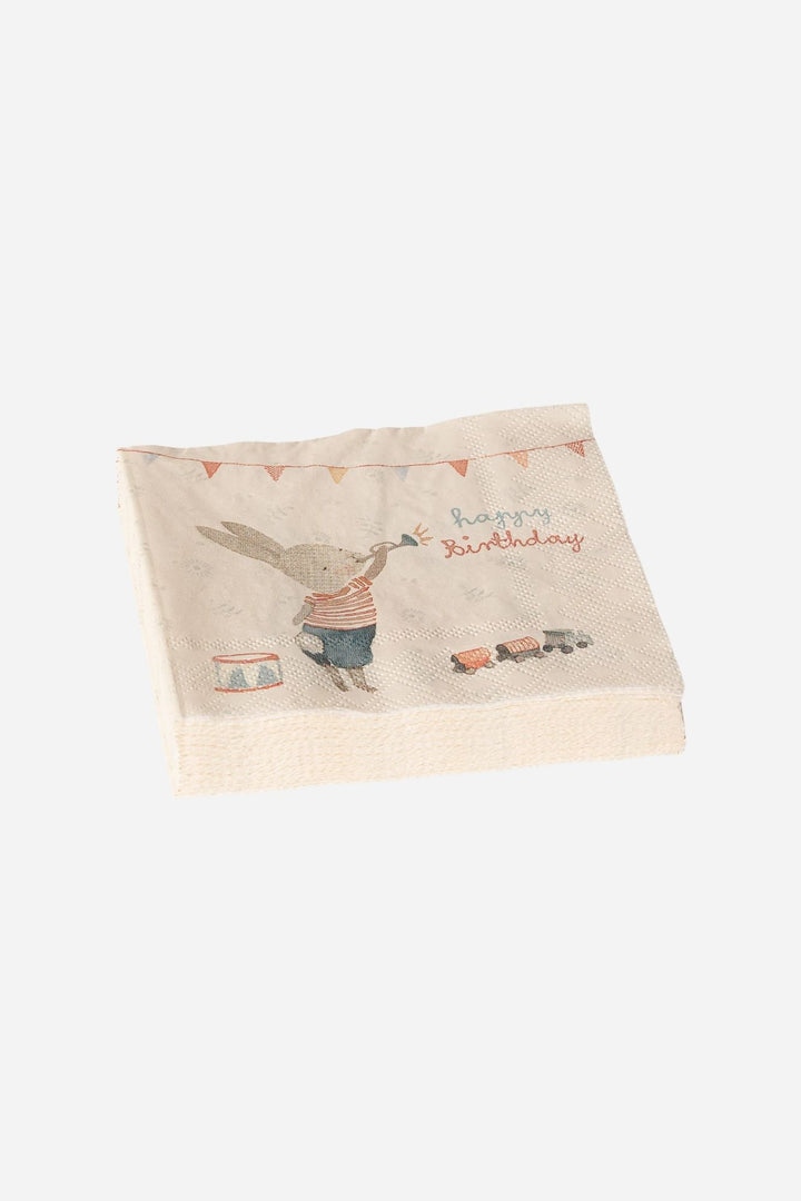 Beige napkin with a printed design of a rabbit and 'Happy Birthday' text on a white background