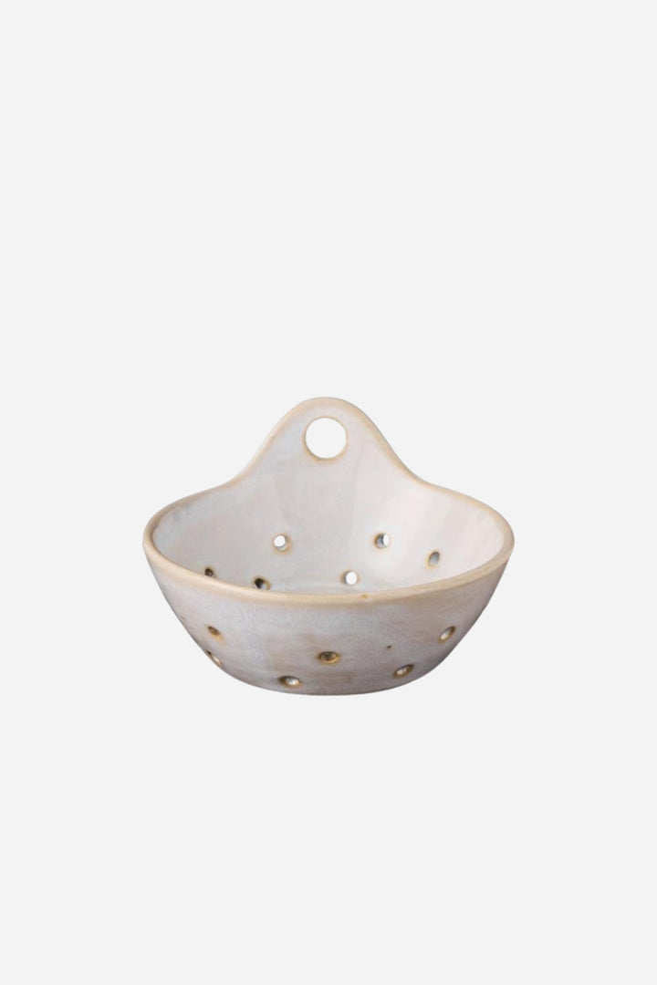 Ceramic Strainer in front of white back ground