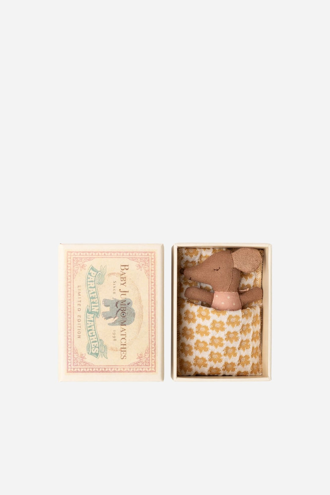 Small teddy mouse in a decorative box with a floral pattern on a white background