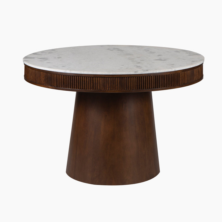 Round table with marble top and wooden base on a white background