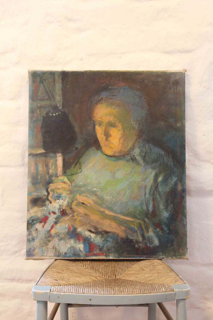 Oil painting of a woman sitting on a chair against a white wall