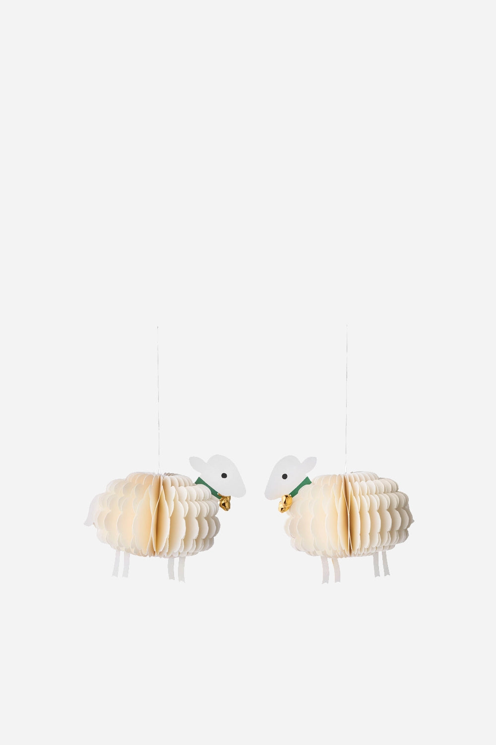 two hanging paper sheep decorations