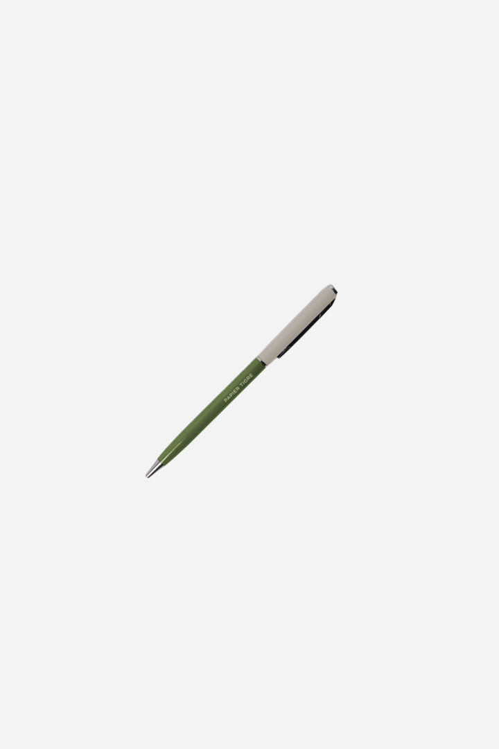 Green pen on a white background