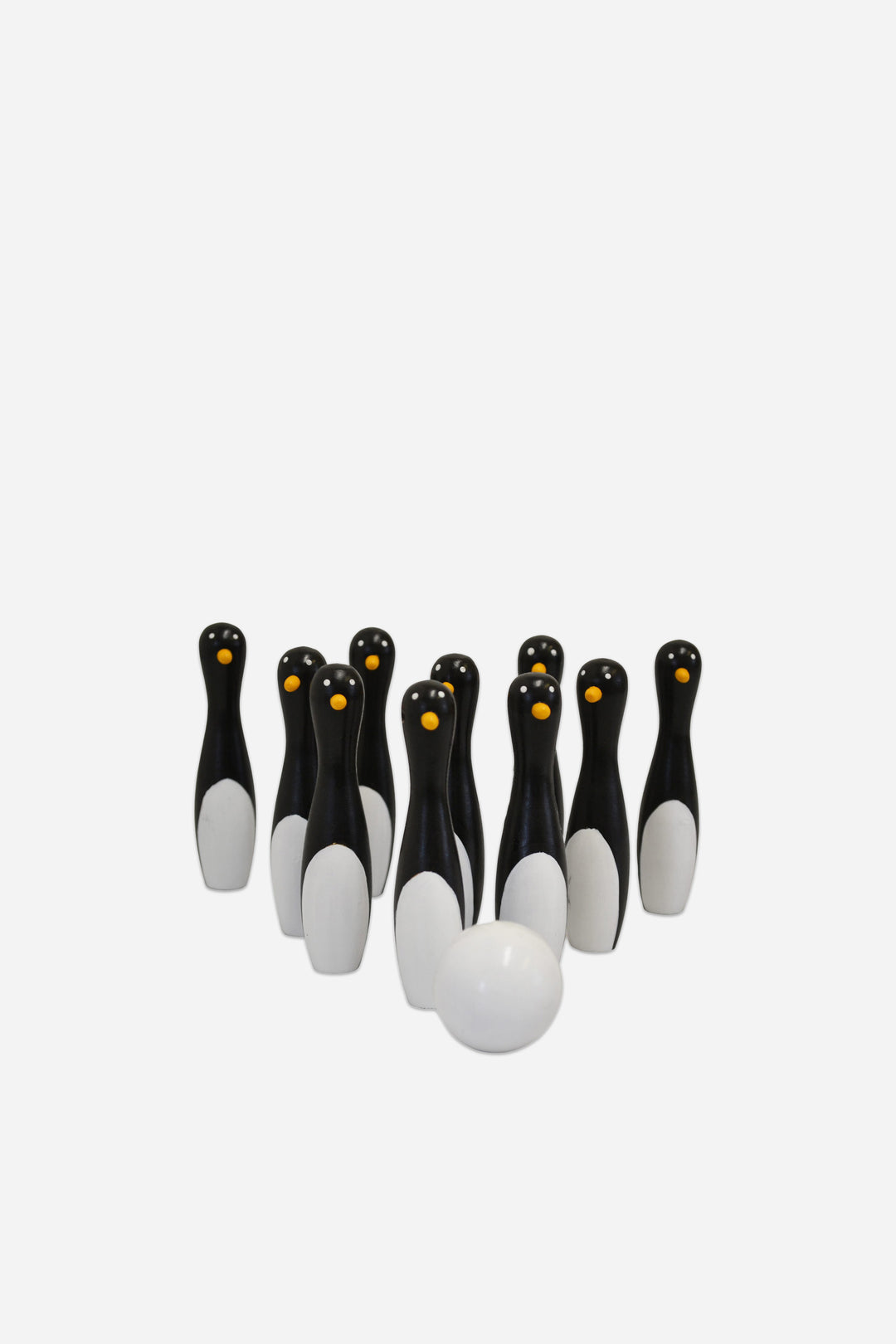 Set of six penguin-shaped bowling pins on a white background