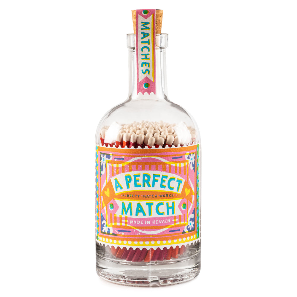 glass bottle filled with matches with decorative perfect match label by the printed peanut