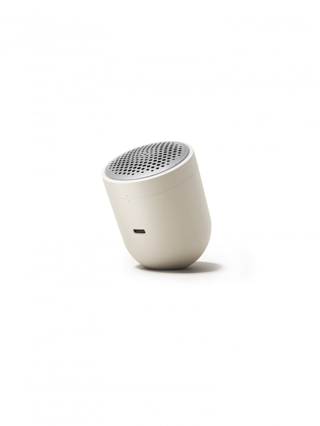 Small white fabric shaver on a white background