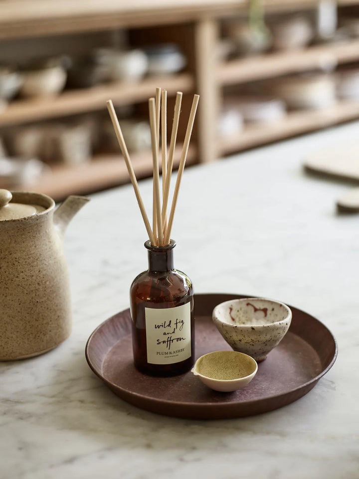 plum and ashby diffuser wild fig and saffron with reeds on tray