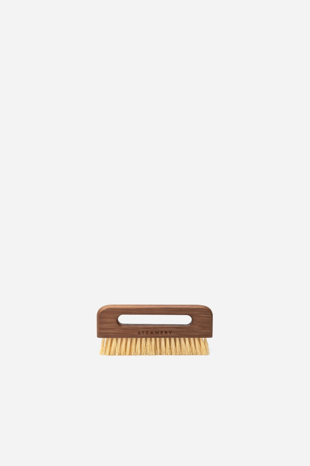 Wooden brush with a handle on a white background