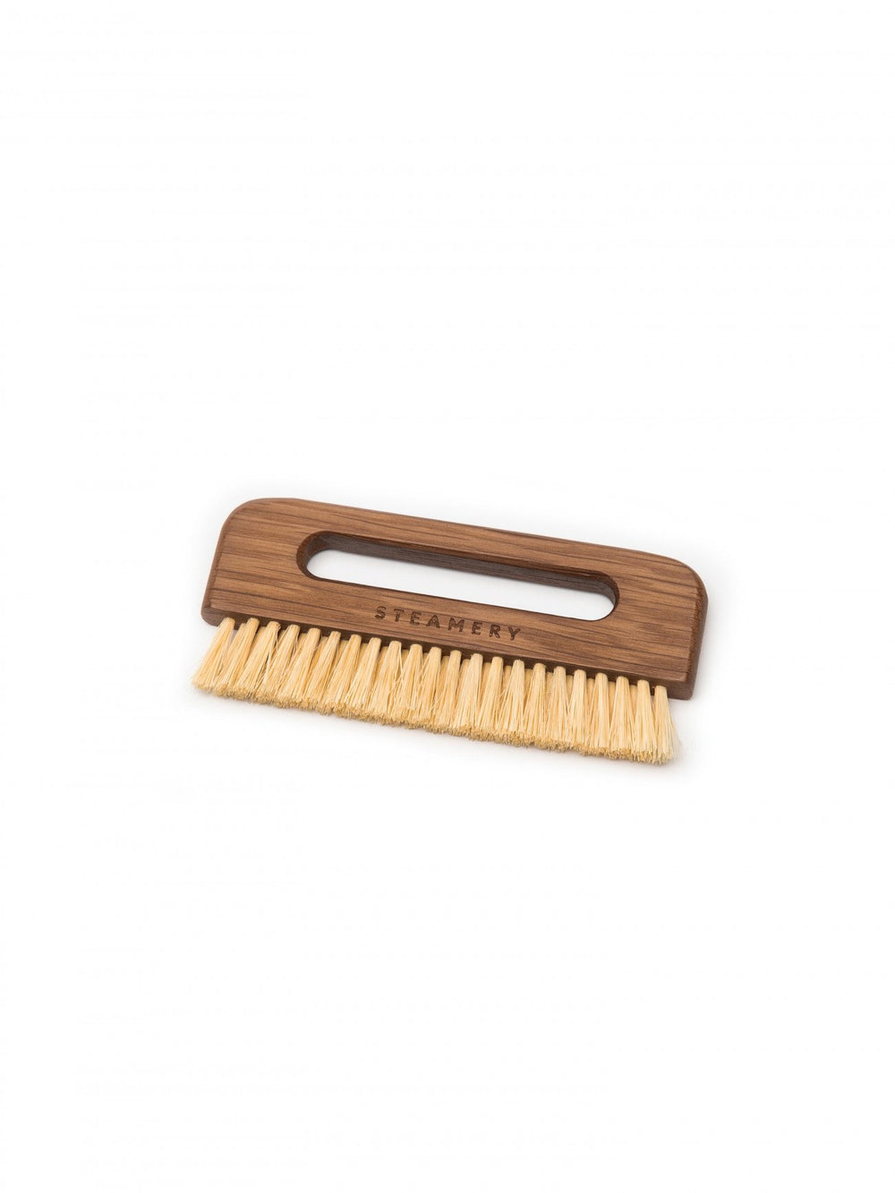 Wooden brush with a handle on a white background