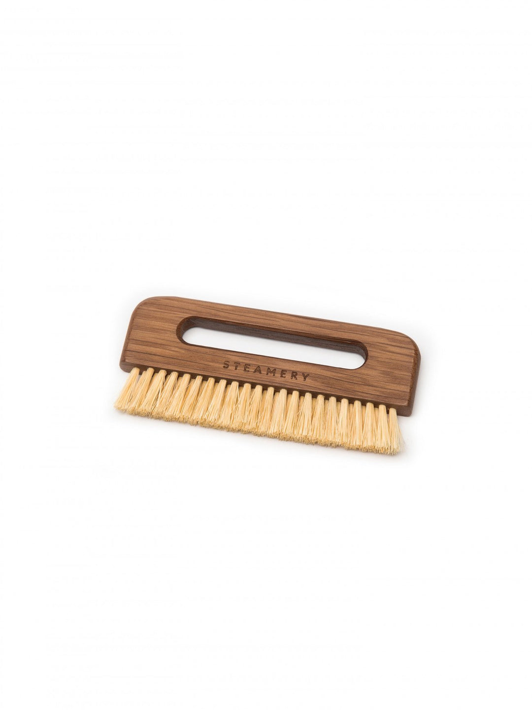Wooden brush with a handle on a white background