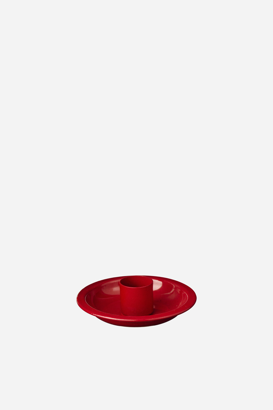 Red candle holder on a white background