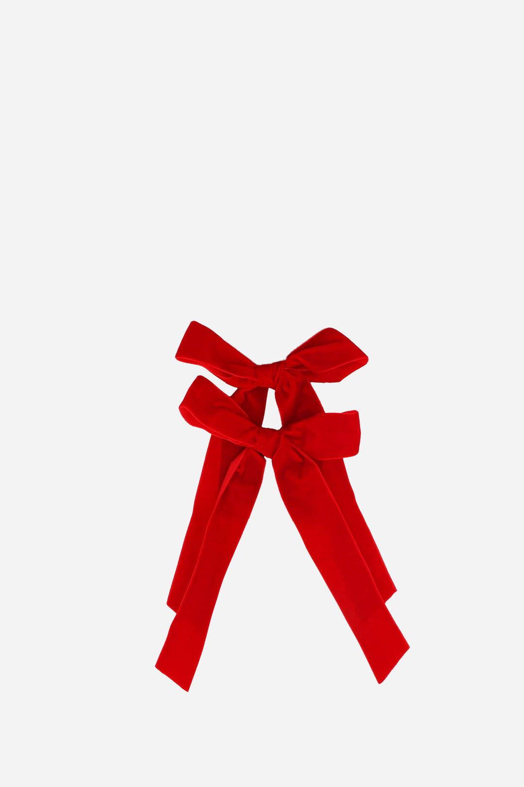 Red bow decorations on a white background