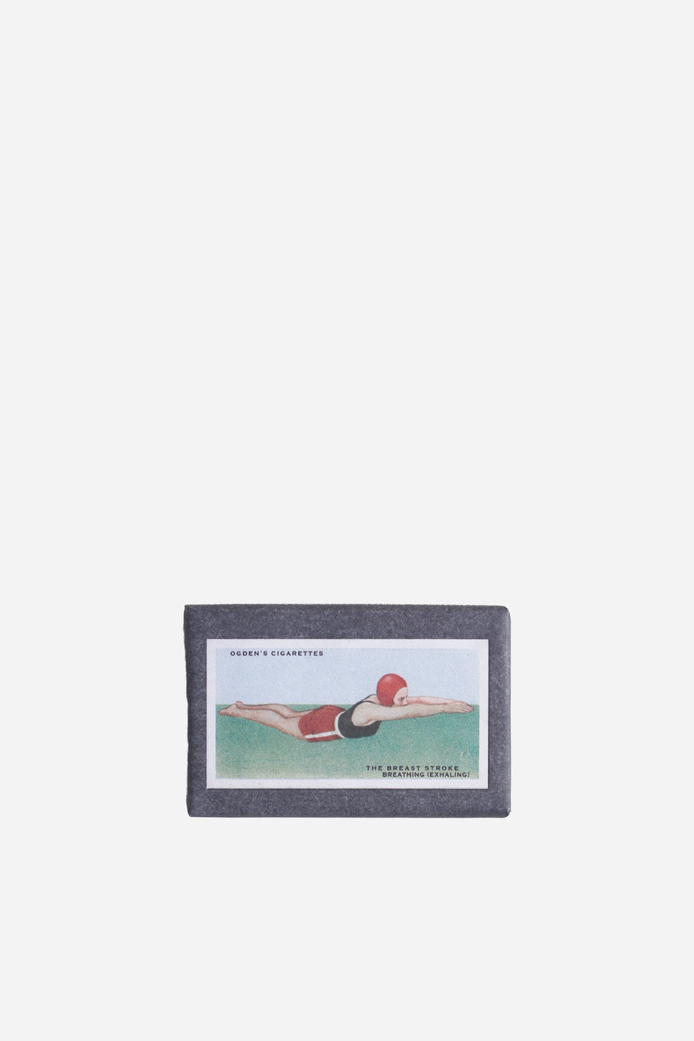 retro olive soap in vintage inspired cigarette packaging swimming
