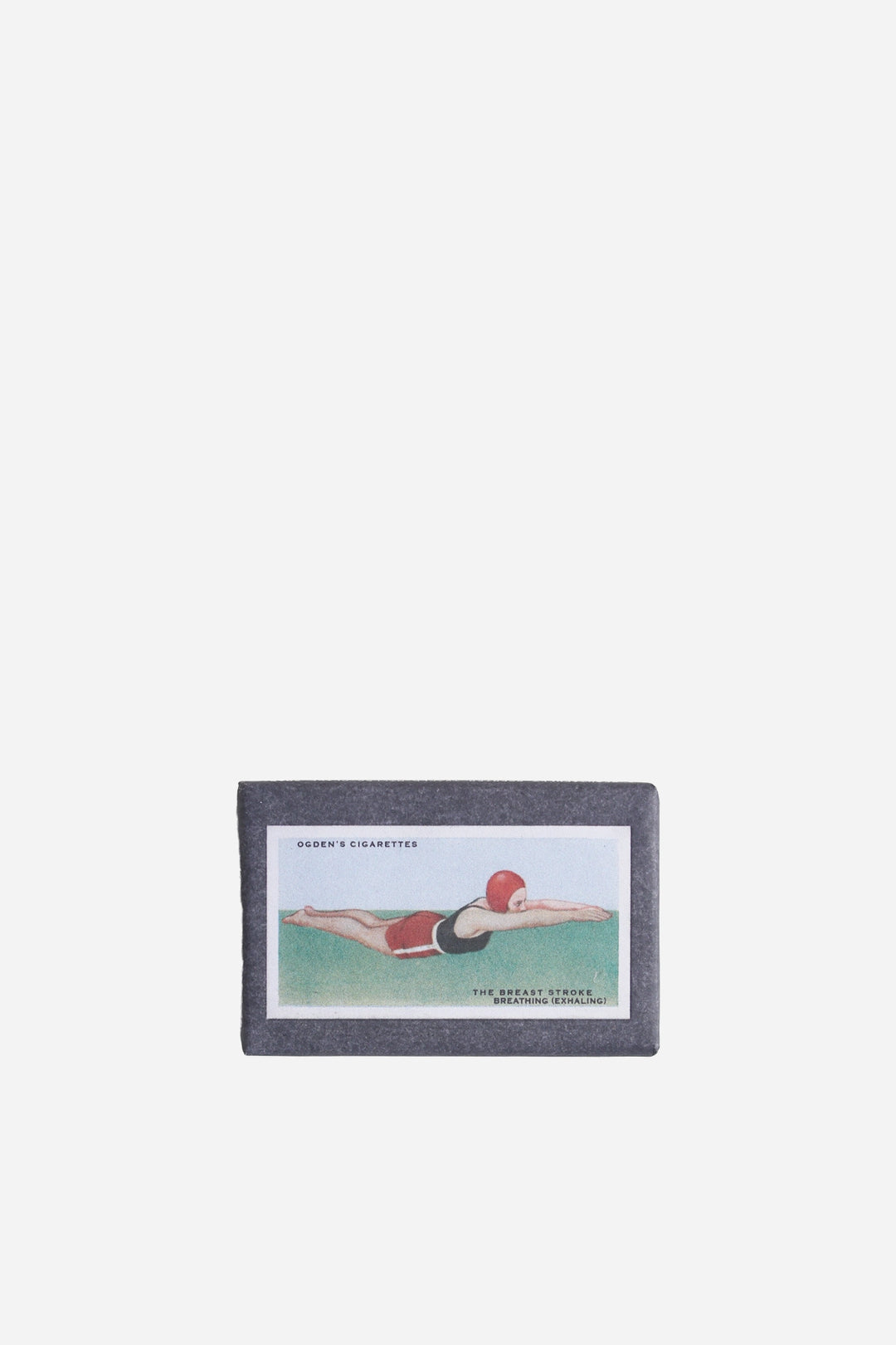retro olive soap in vintage inspired cigarette packaging swimming