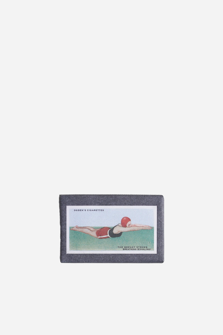 retro olive soap in vintage inspired cigarette packaging swimming