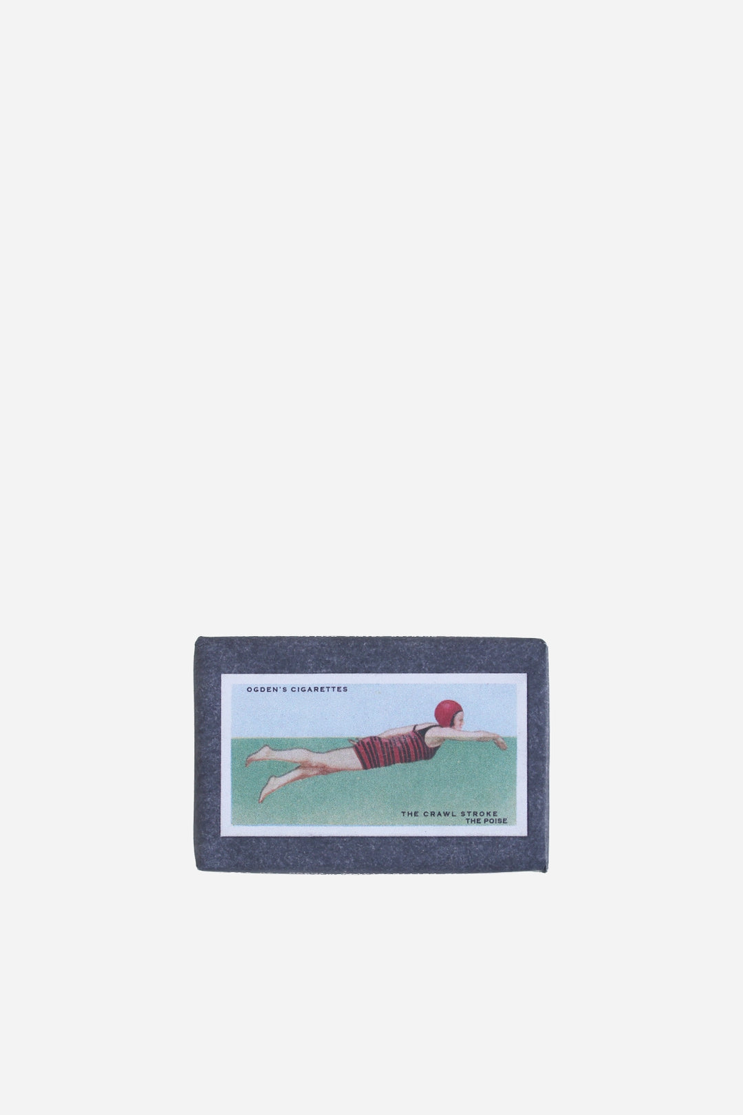 retro olive soap bar with vintage cigarette packaging swimming