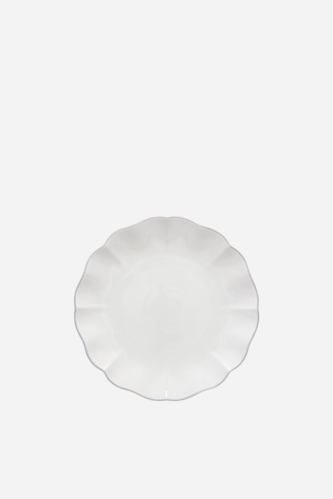 White ceramic plate on a white background